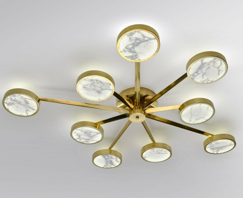 Unveiling the Costellazione: An Asymmetrical Brass Chandelier with Calacatta Marble Elegance